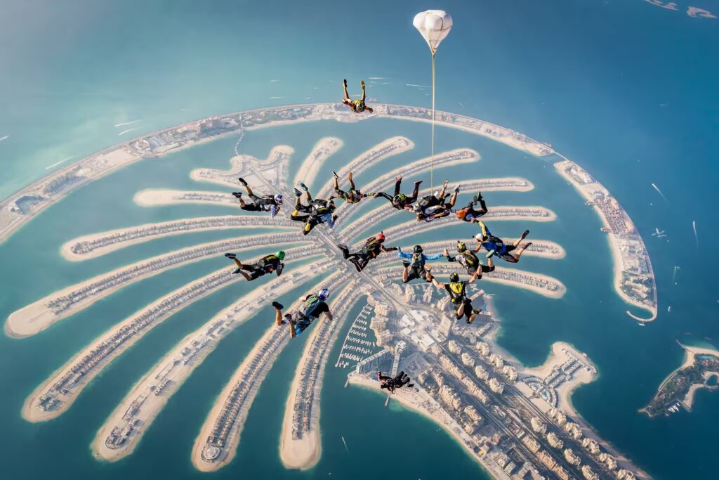 Skydiver's perspective view showing Palm Jumeirah and Burj Khalifa
